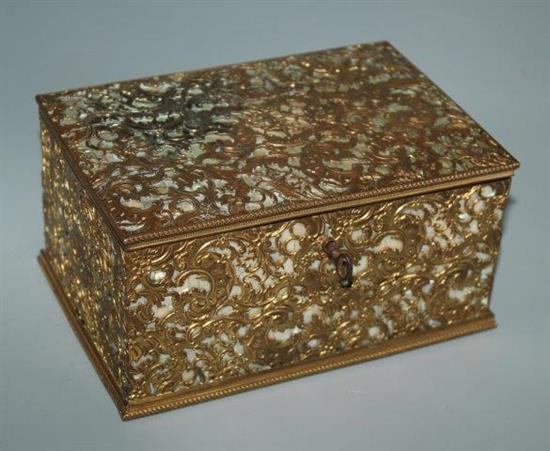 Ornate gilt metal casket